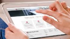 A man is Browsing our website support center.